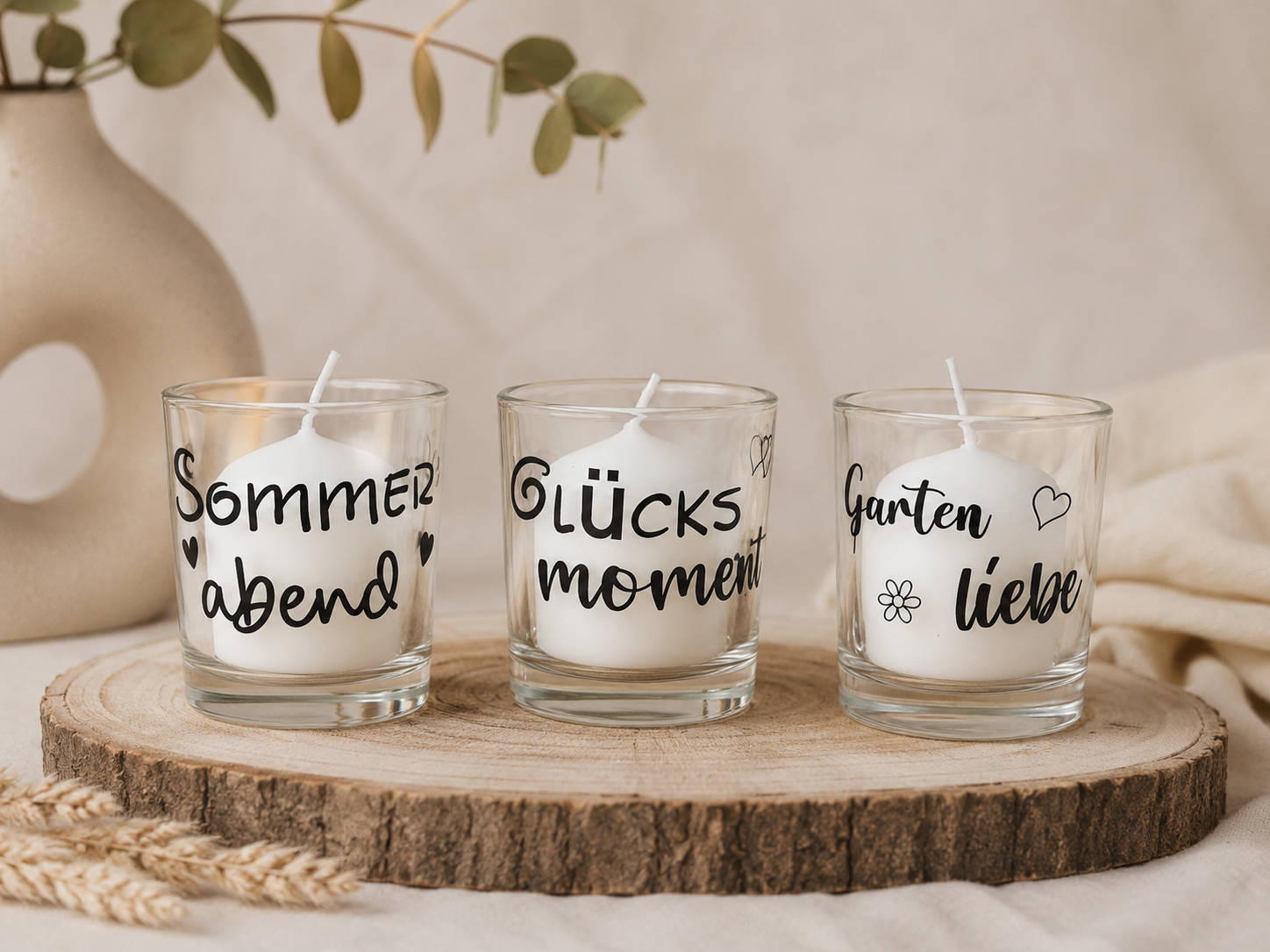 Drei Windlichter mit Sprüchen 'Sommerabend', 'Glücksmoment' und 'Gartenliebe'